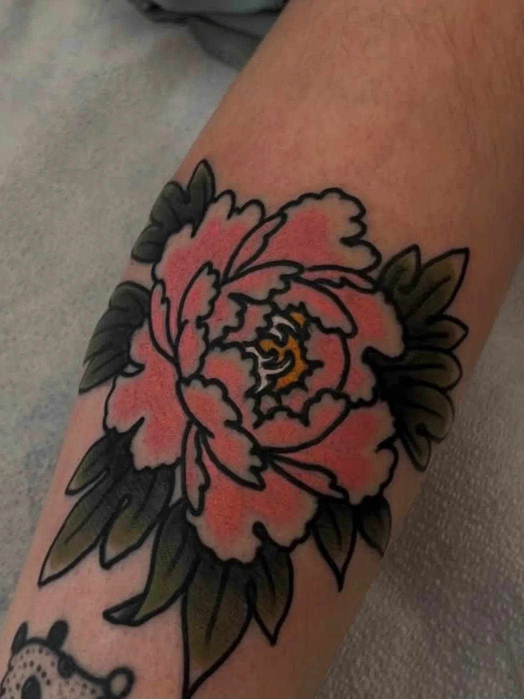 Pink peony with leaves, Japanese style by Kaichi Fujita, Alliance Tattoo Eugene Oregon
