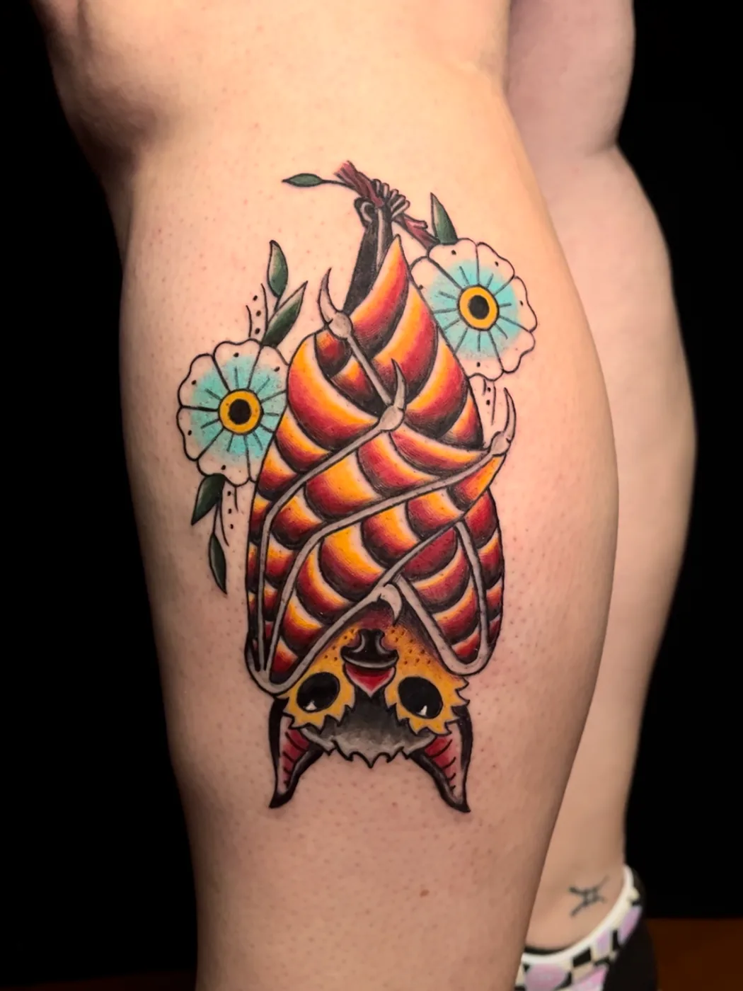 Traditional bat with flowers by Ky Bell, Alliance Tattoo Eugene Oregon
